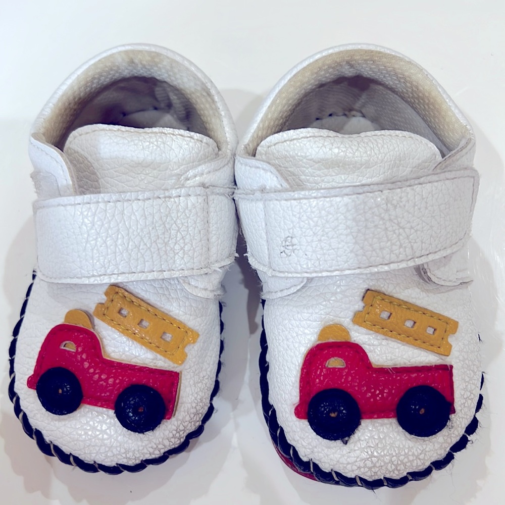 White soft baby shoes
